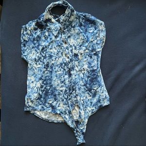 Blue and white tie dye shirt.